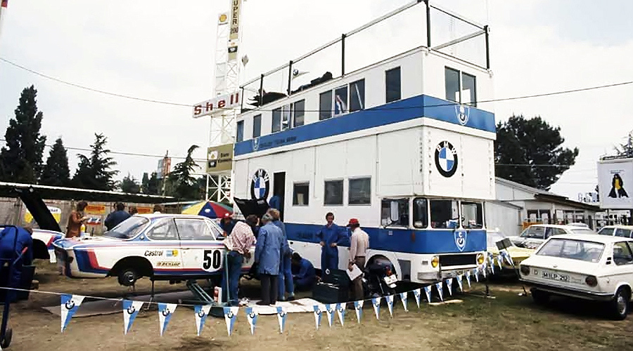 'Inside the Paddock: Racing Transporters at Work'