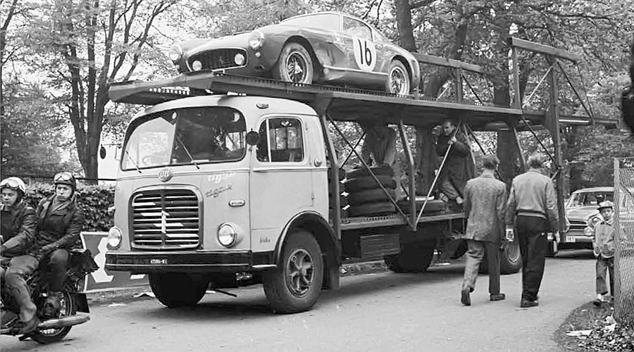 'Inside the Paddock: Racing Transporters at Work'