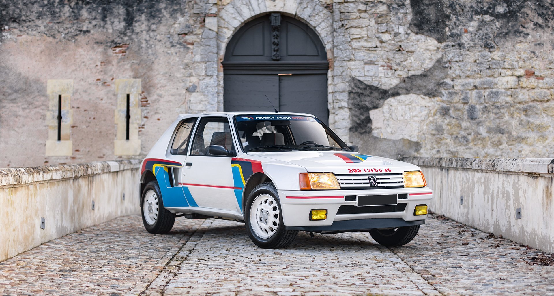 This pearl-white Peugeot 205 T16 is a street-legal rally icon