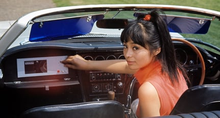 Akiko Wakabayashi as Bond Girl Aki, driving a one-off Toyota 2000 GT convertible in &#039;You Only Live Twice&#039;.