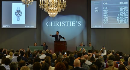 Christie&#039;s Auctioneer Aurel Bacs in his element at the Rolex Daytona Auction in Geneva