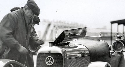 Lionel Martin inspects his car