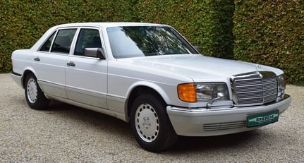 Mercedes 560 SEL. Ex-embassy car. Low mileage.