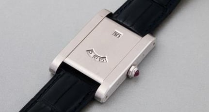 Cartier A limited edition and attractive platinum rectangular wristwatch with jump hour and wandering minutes made to commemorate Cartier s 150th anniversary Classic Driver Market