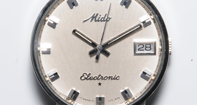 Mido electronic top