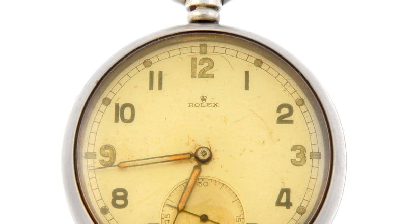 A nickel plated base metal military pocket watch by Rolex