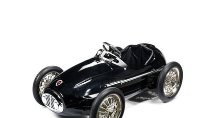 A Black Racer pedal car by American Retro Classic Driver Market