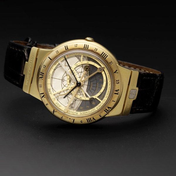 - Ulysse Nardin. A fine gold automatic wristwatch incorporating a ...