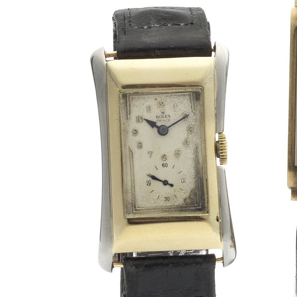- Rolex. A fine two colour 9ct gold manual wind rectangular wristwatch ...
