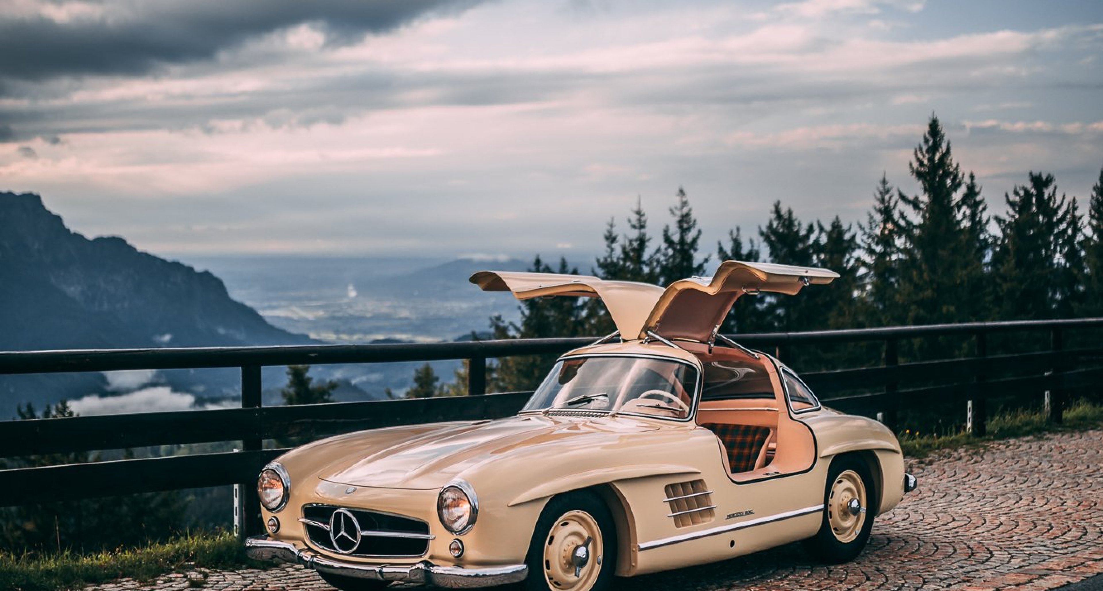 Soaring Above The Clouds With An Ivory Mercedes Benz 300sl Gullwing Classic Driver Magazine