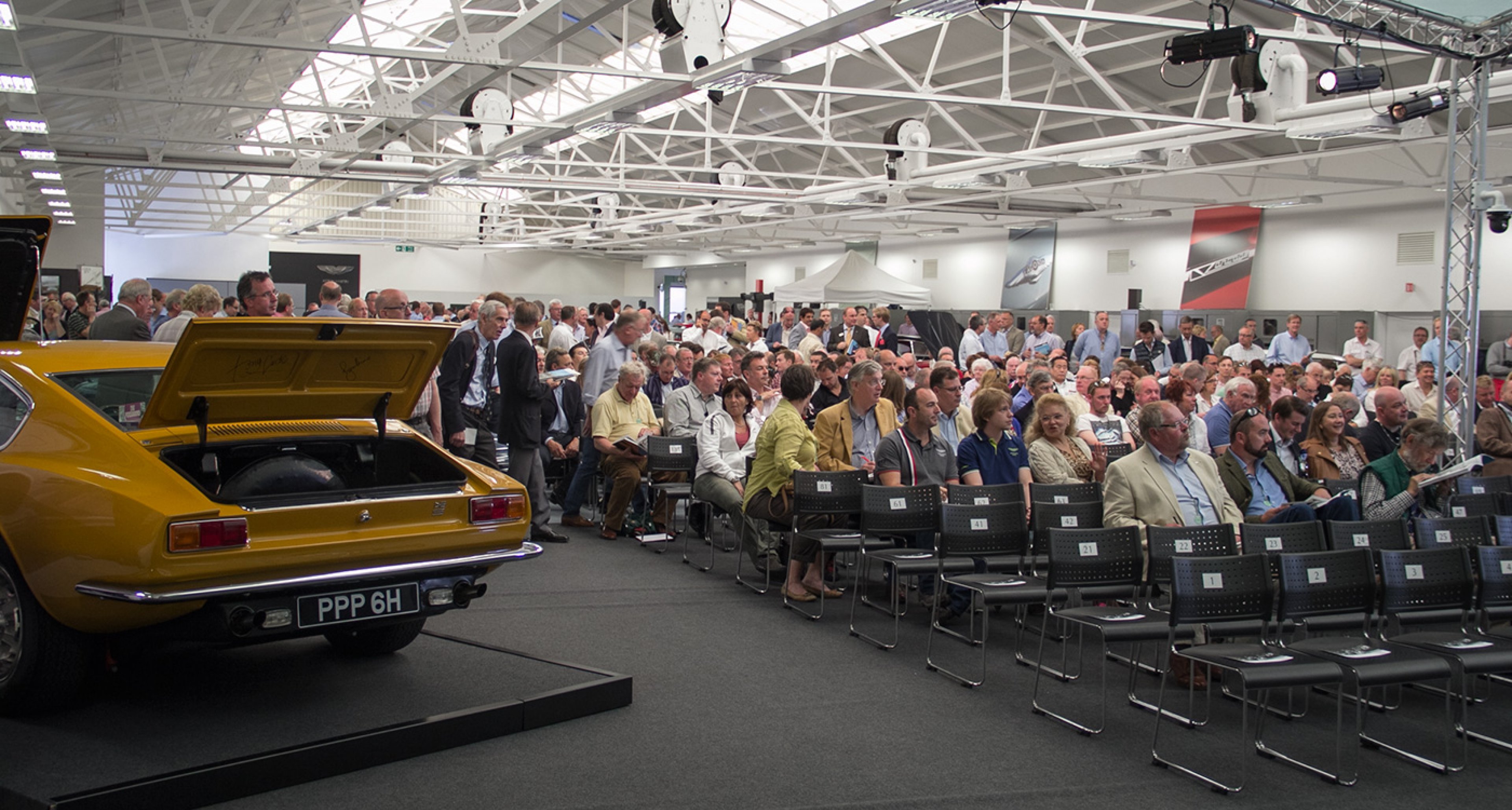A record number of attendees witnessed frantic bidding wars at the single-marque sale