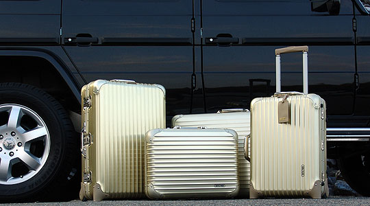 rimowa gold suitcase