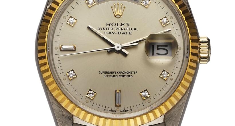 rolex oyster perpetual day date silver and gold