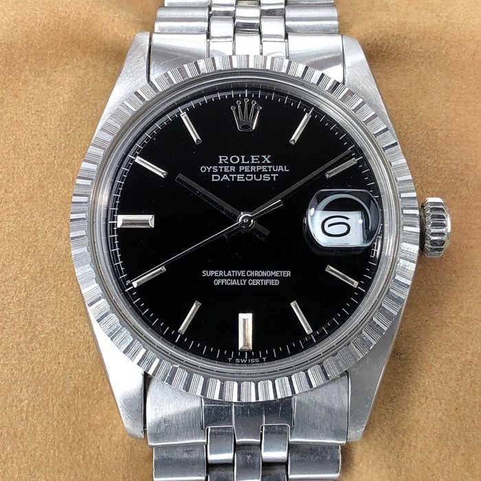 silver rolex with black face